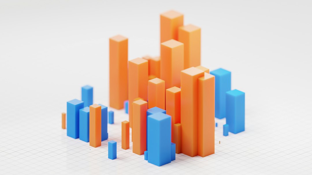 3D bar chart with orange and blue blocks on a white grid background, representing data values.