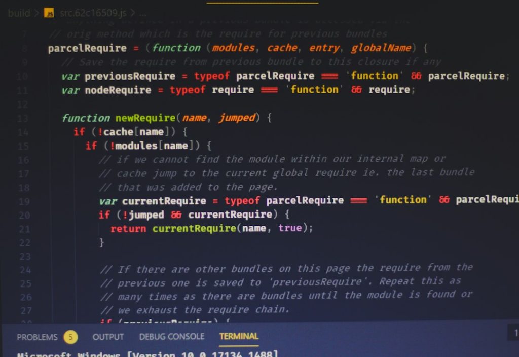 Code editor screenshot showing a JavaScript module loader with a newRequire function and colored syntax highlighting